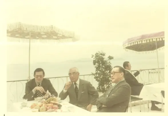 A party on the patio of Wah Kwong Cottage